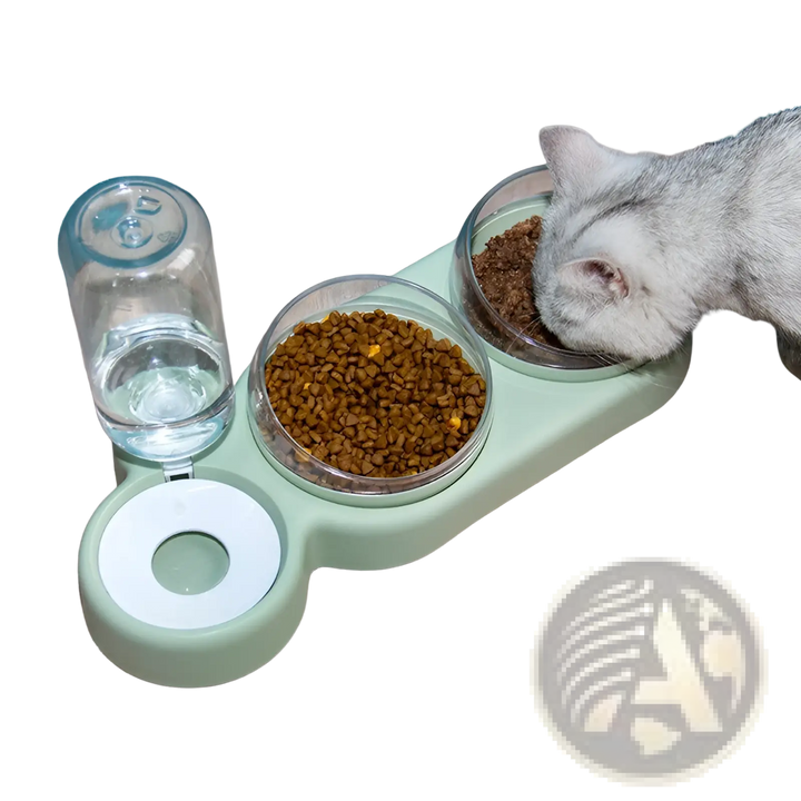 Mint green automatic pet feeder with water fountain, twin bowls filled with kibble for cat