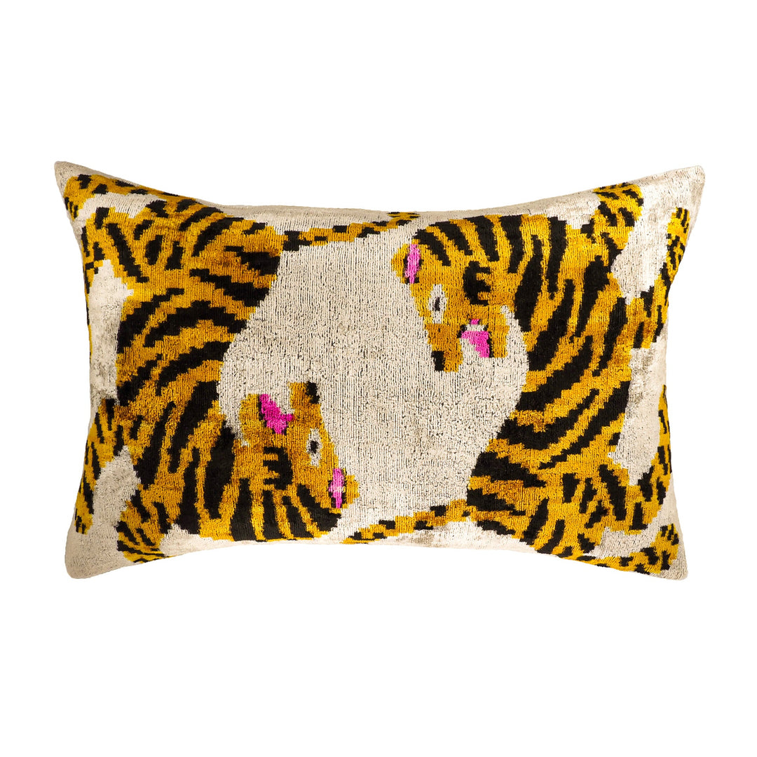 Ikat throw pillow cover with tiger motif, cream base, yellow pattern, pink accents