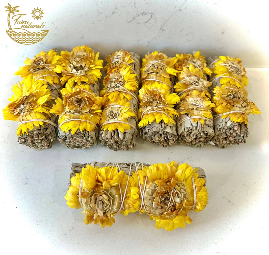 Sunflower and white sage smudge bundles, multiple tied rolls with yellow blooms