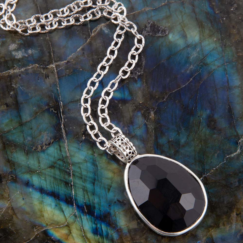 Sterling silver teardrop pendant necklace with faceted black onyx stone