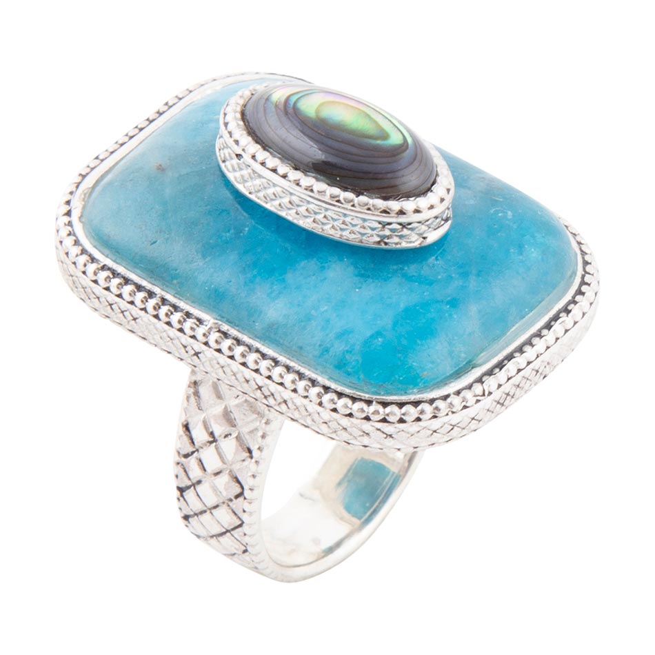 Sterling silver ring with turquoise oval stone and stacked abalone center