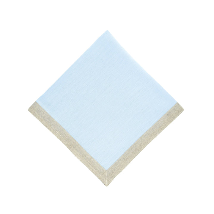 Light blue linen napkin with beige border trim, square folded