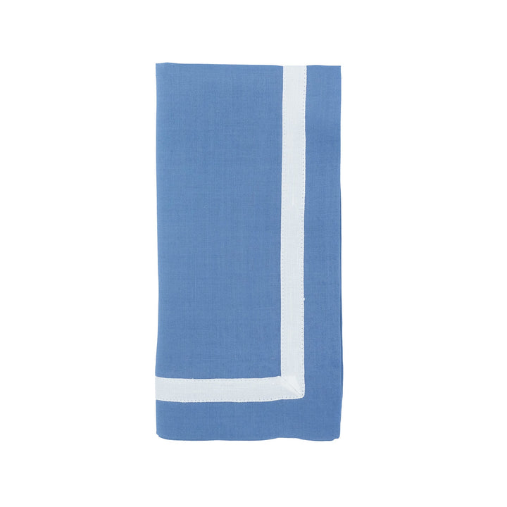 Blue linen napkin with white border stripe on the edge