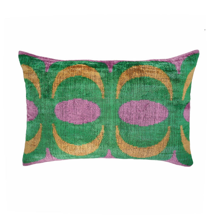 Silk velvet ikat throw pillow in green and purple with geometric pattern