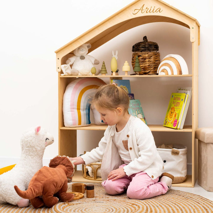 Wood dollhouse bookcase with arched top, open shelves and toys, personalized "Aria"