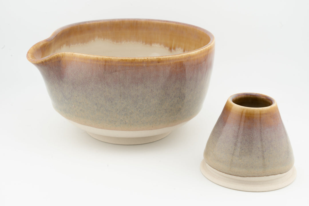 Amber ceramic matcha bowl with matching whisk stand, no whisk included.