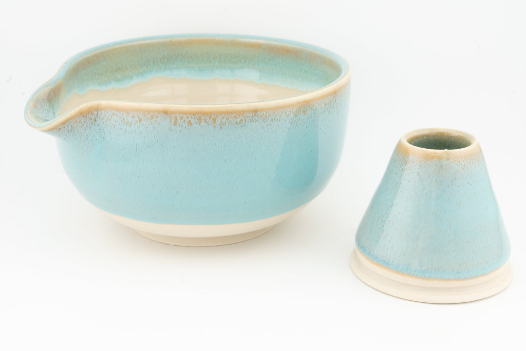Turquoise ceramic matcha bowl with spout and matching whisk holder