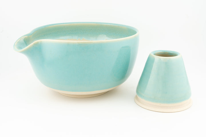 Turquoise ceramic matcha bowl with spout and matching whisk holder