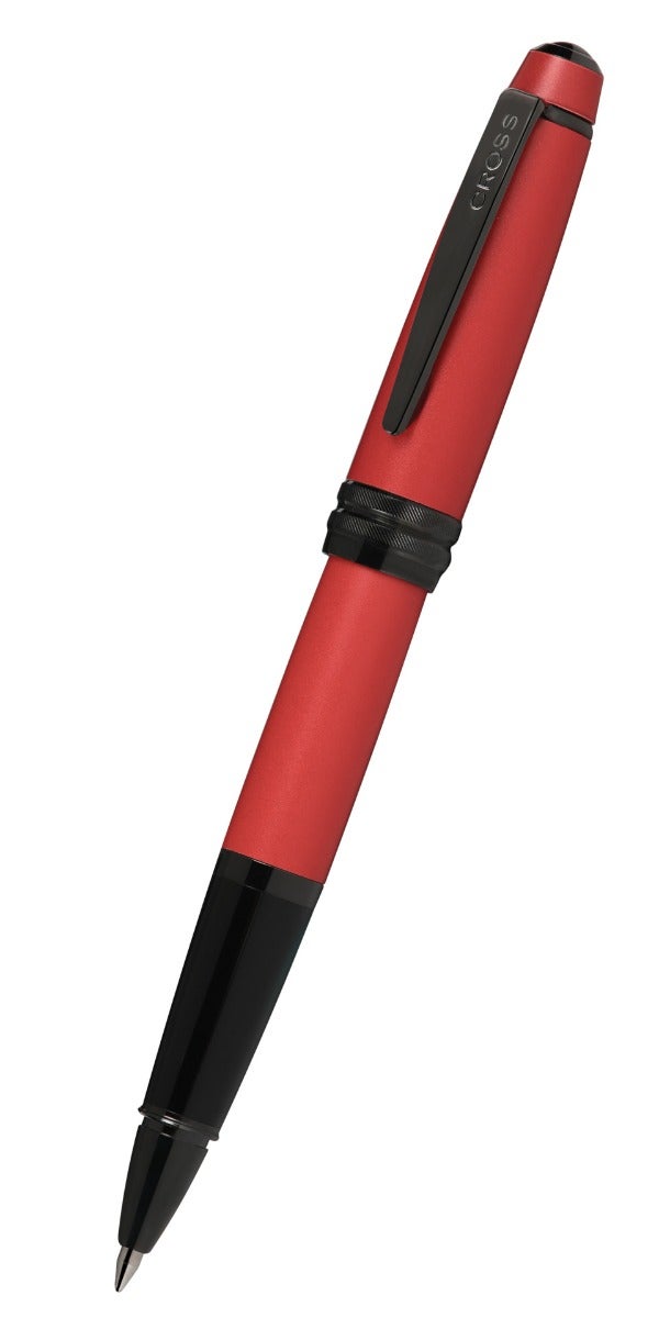 Matte red rollerball pen with black end cap and clip, side view