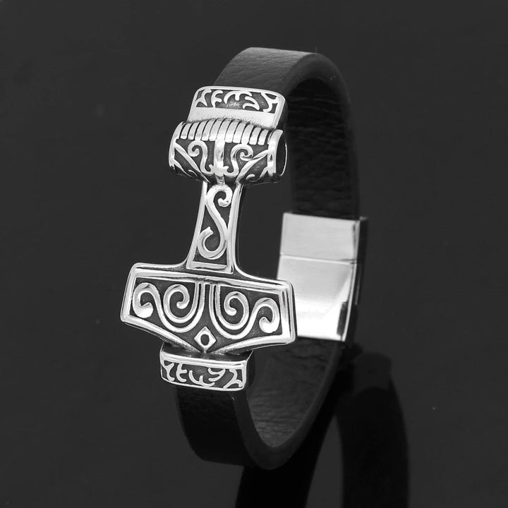 Black leather bracelet featuring stainless steel Mjolnir hammer charm with stamped details