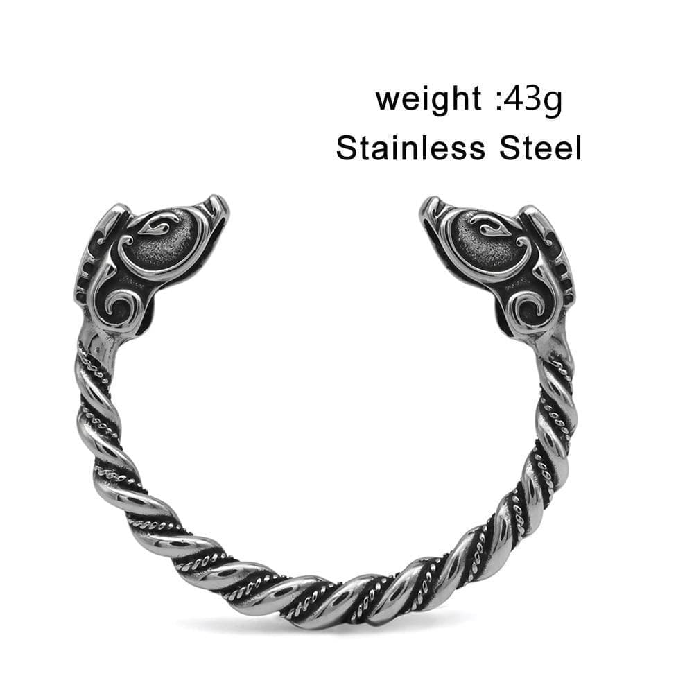 Stainless steel bracelet with dragon head ends, twisted links; weight 43g