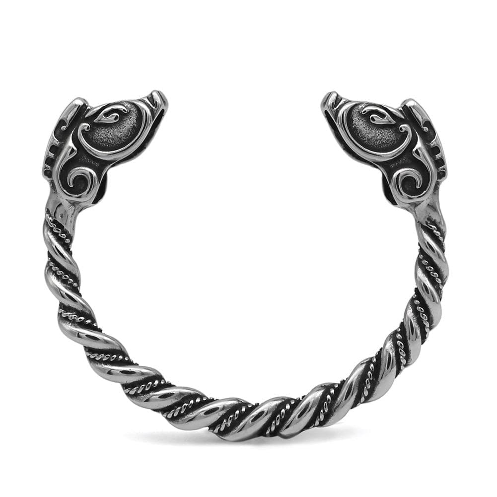 Stainless steel bracelet with twisted chain links and engraved dragon head end pieces