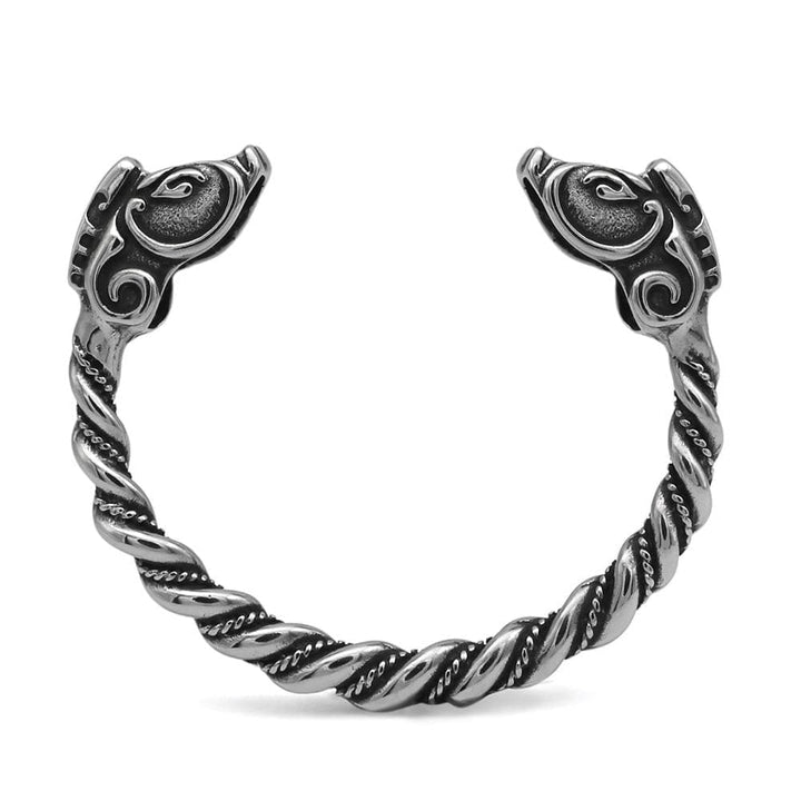 Stainless steel bracelet with twisted chain links and engraved dragon head end pieces