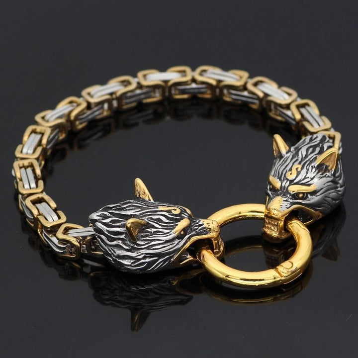Wolf head charm bracelet with gold ring clasp on two-tone metal chain links