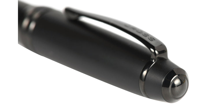 Matte black fountain pen cap end with glossy trim, close-up