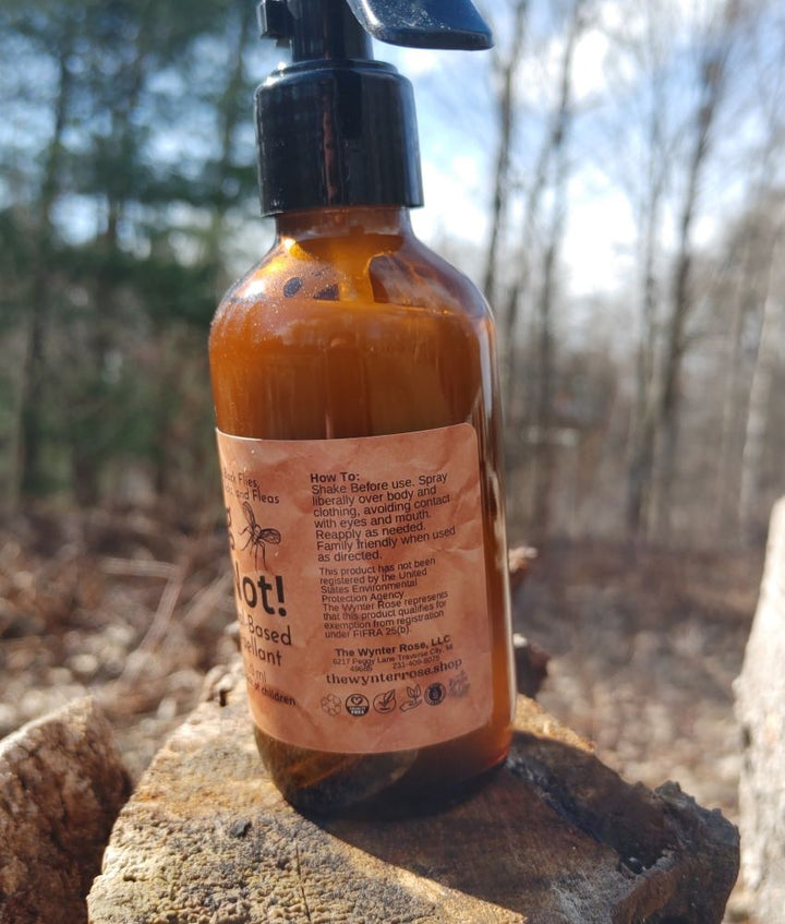 Bug Not plant-based insect repellent spray bottle with black nozzle, amber liquid