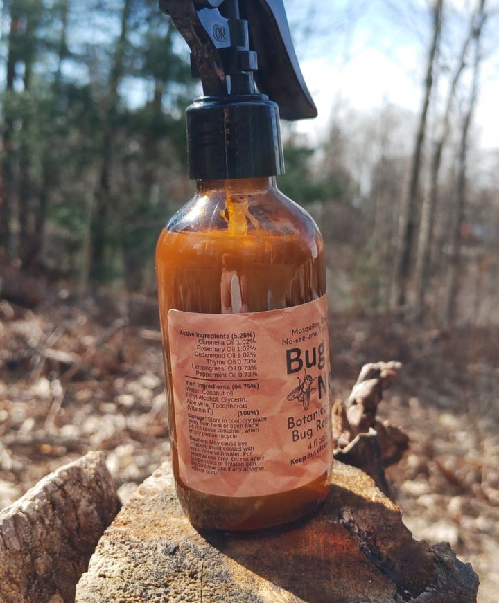 Bug Not plant-based insect repellent spray bottle, amber liquid with black pump sprayer