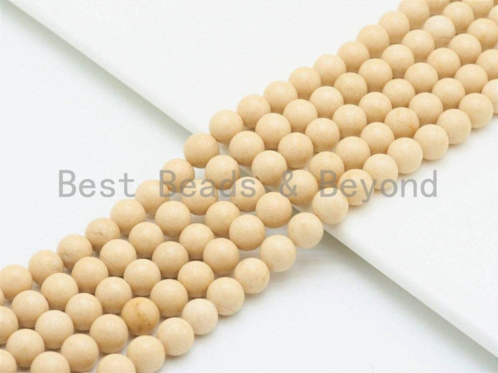 Cream round smooth agate beads strand, curved lines of small rounded beads