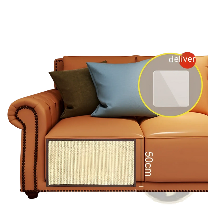 Cat sofa protector scratching mat on orange leather-style sofa, tan woven panel on arm