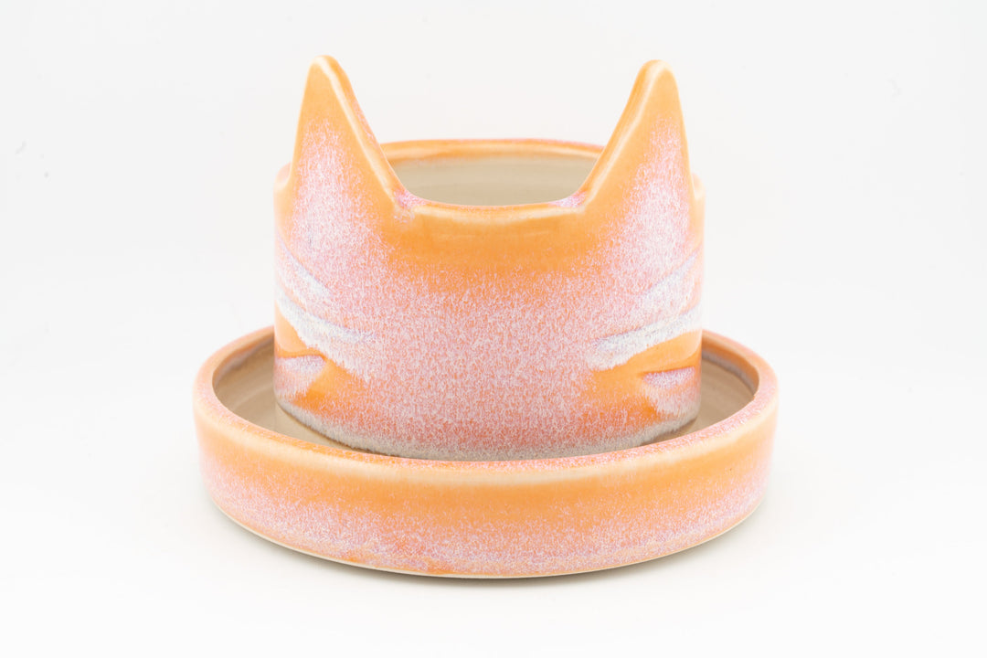 Peach and orange speckled kitty cat ceramic planter with raised ears
