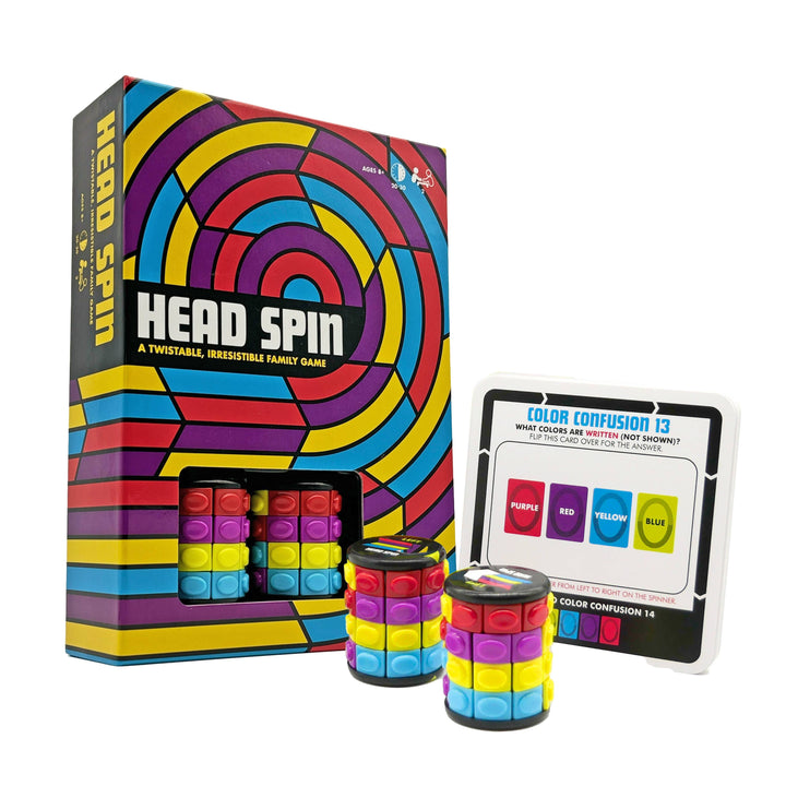 Family fidget board game box with colorful spiral art and stacked plastic spinner cubes