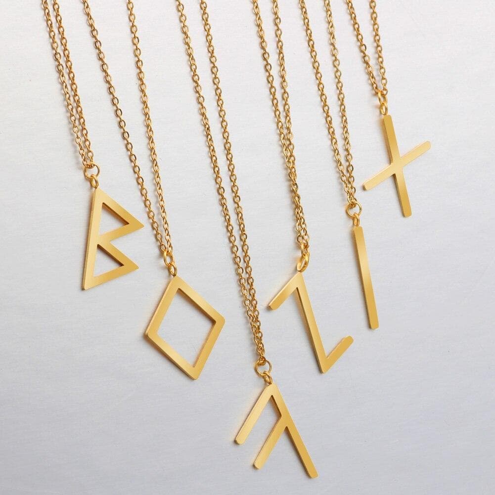 Gold-tone Viking rune pendant necklaces with multiple rune symbols on chain