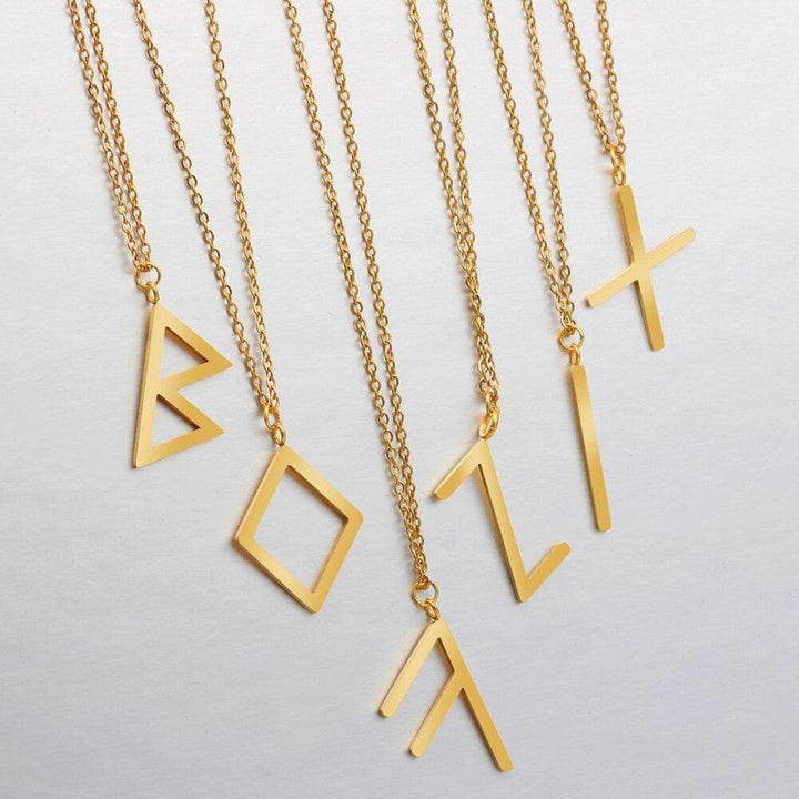 Gold-tone Viking rune pendant necklaces with multiple rune symbols on chain