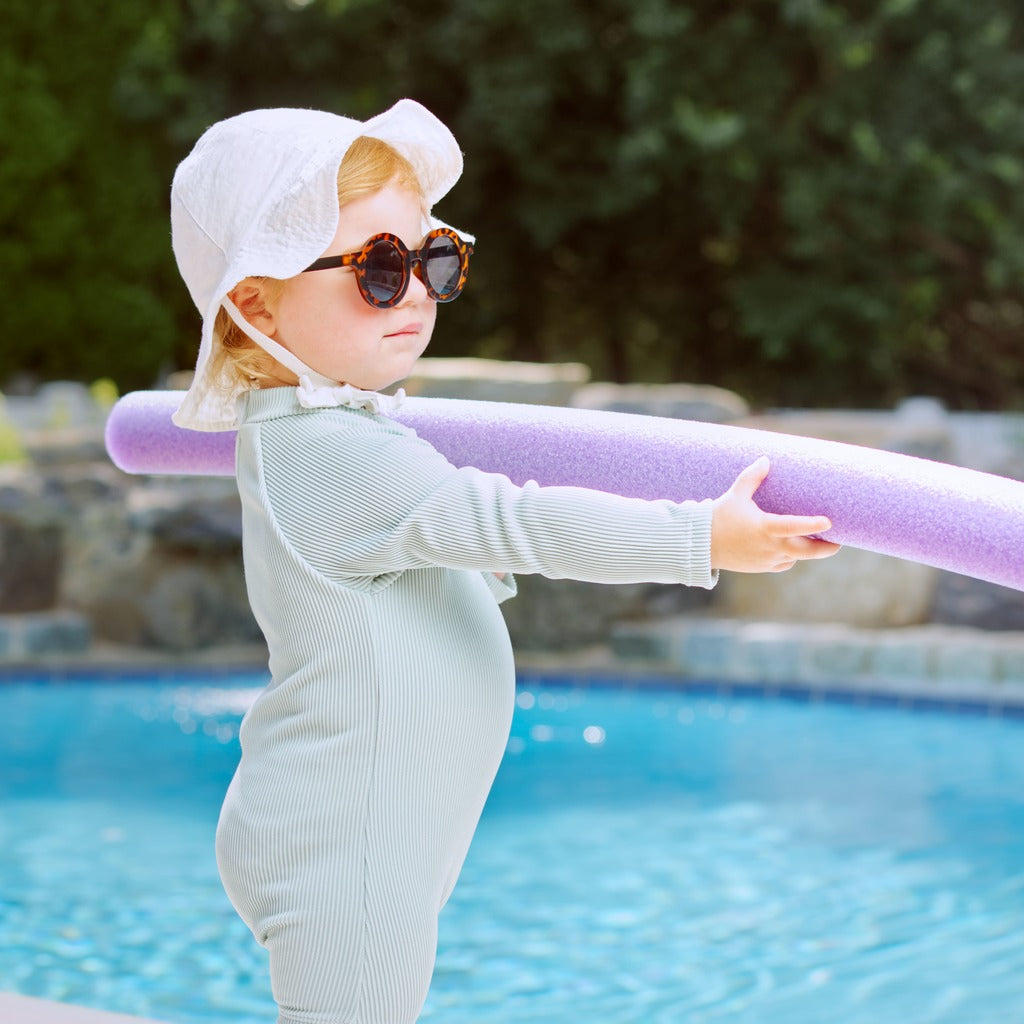Mint ribbed long-sleeve rash guard swimsuit with shorts