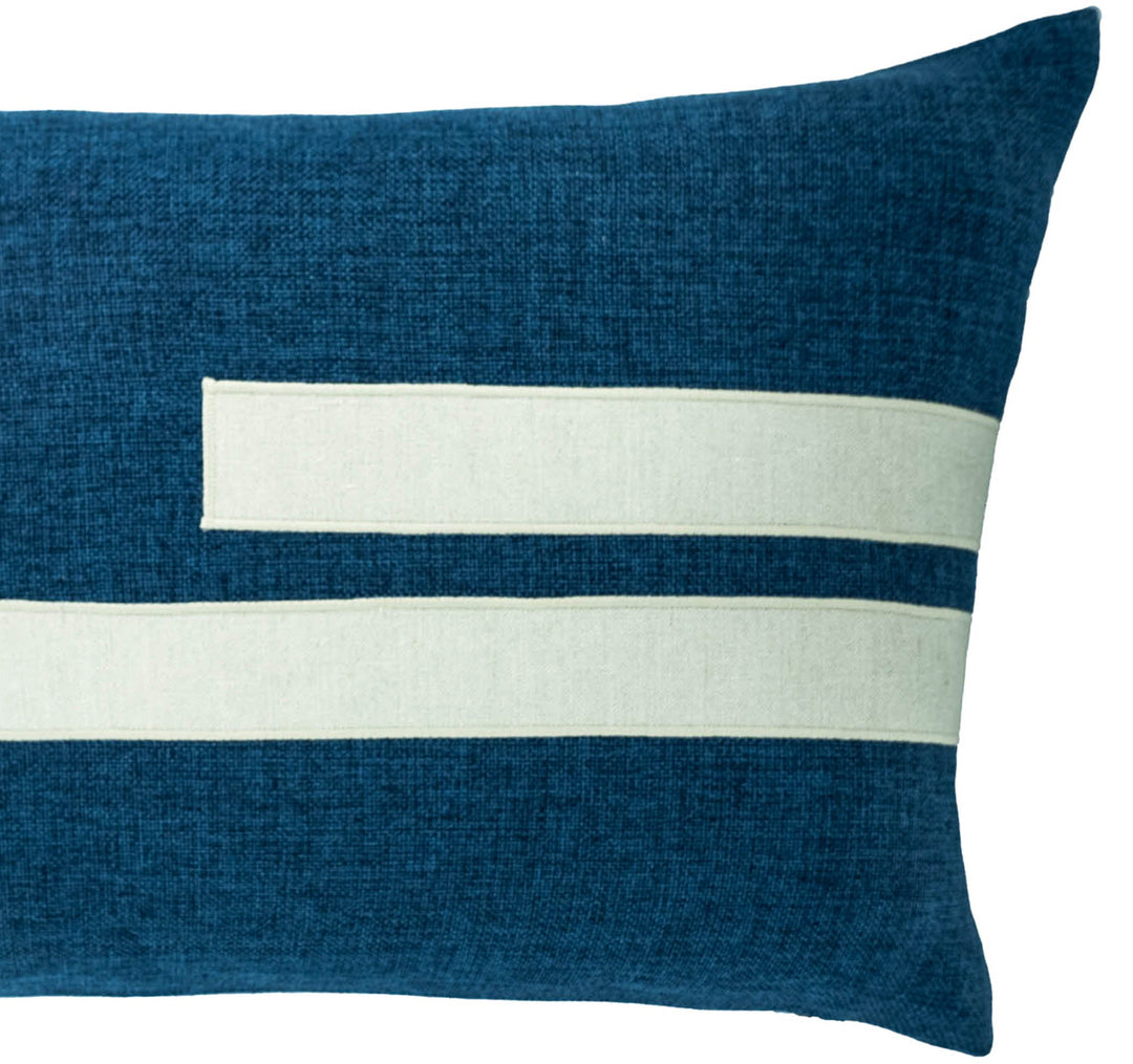 Blue throw pillow close-up, 16"x24", two white horizontal stripes on front
