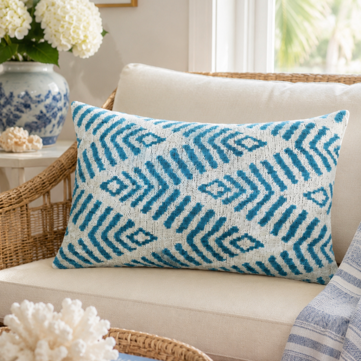 Cream ikat pillow cover with blue geometric pattern, silk velvet