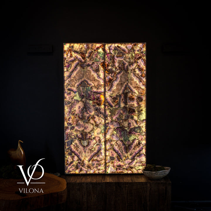 Framed fluorite crystal wall panel with warm golden-brown and purple iridescent mosaic
