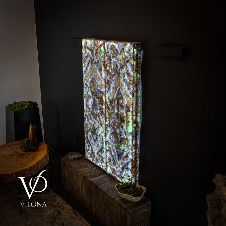 Rectangular fluorite crystal wall panel with multicolor iridescent mosaic in blue and purple