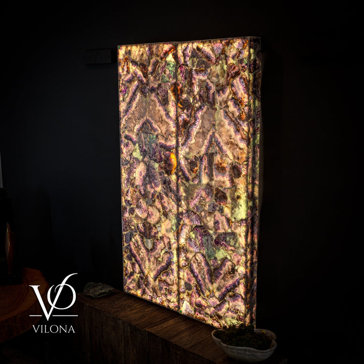 Rectangular fluorite crystal wall panel with copper-gold, pink, and green iridescent mosaic