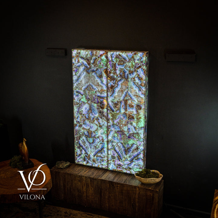 Fluorite crystal wall panel with bright blue and green iridescent mosaic pattern, framed