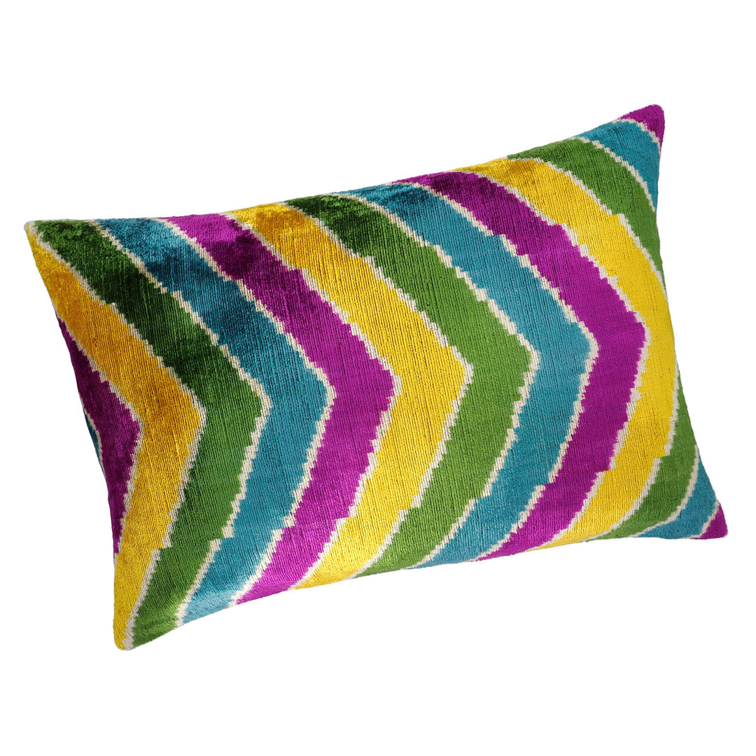Silk velvet ikat pillow cover with diagonal chevron stripes in green, purple, yellow, blue