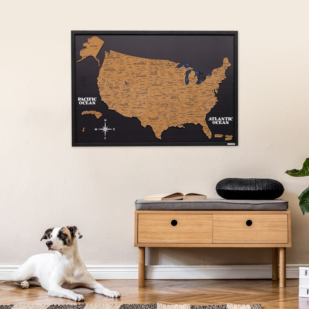 Black-framed cork USA map board mounted on wall