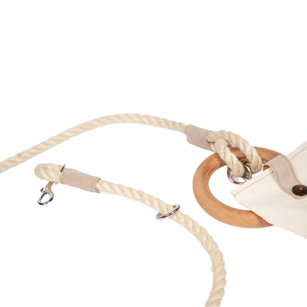 Braided rope dog leash with small canvas storage bag, leather strap and metal clips