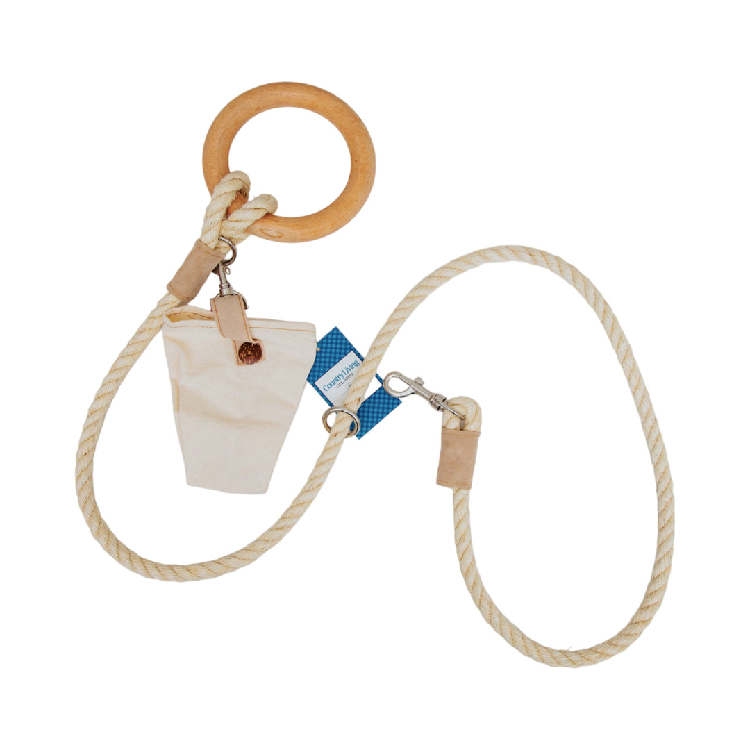 Dog leash with small canvas storage bag, braided rope handle and leather clip accents