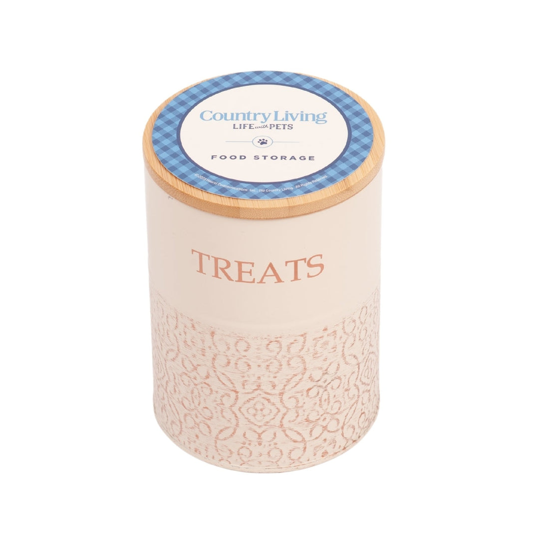 Dog treat canister with bamboo lid, white jar showing “TREATS” and decorative base pattern