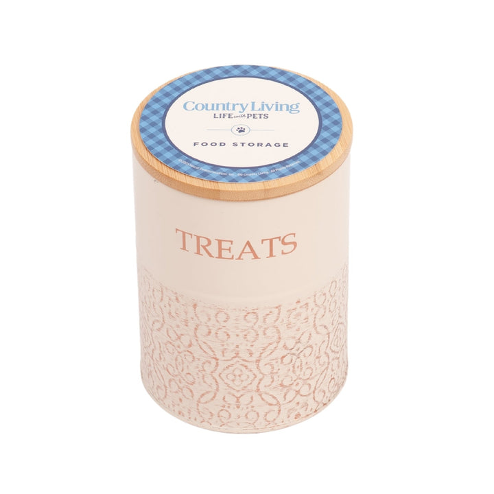 Dog treat canister with bamboo lid, white jar showing “TREATS” and decorative base pattern