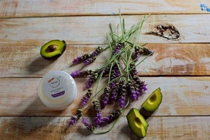 BeNat natural deodorant cream jar on wooden surface with lavender stems