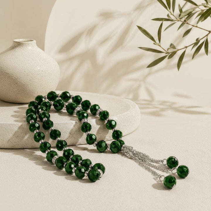 Crystal glass Muslim prayer tasbeeh with dark green faceted beads and tassel ends