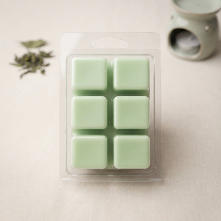 Wax melt cubes in clear clamshell, pale mint green, six-square layout