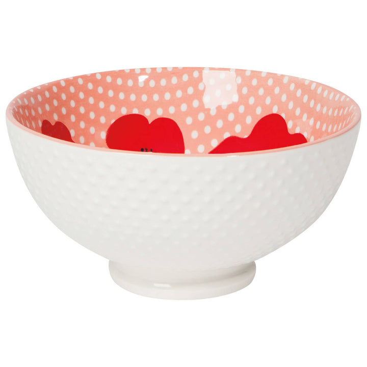 White bowl with pink interior, red poppy and white polka-dot pattern