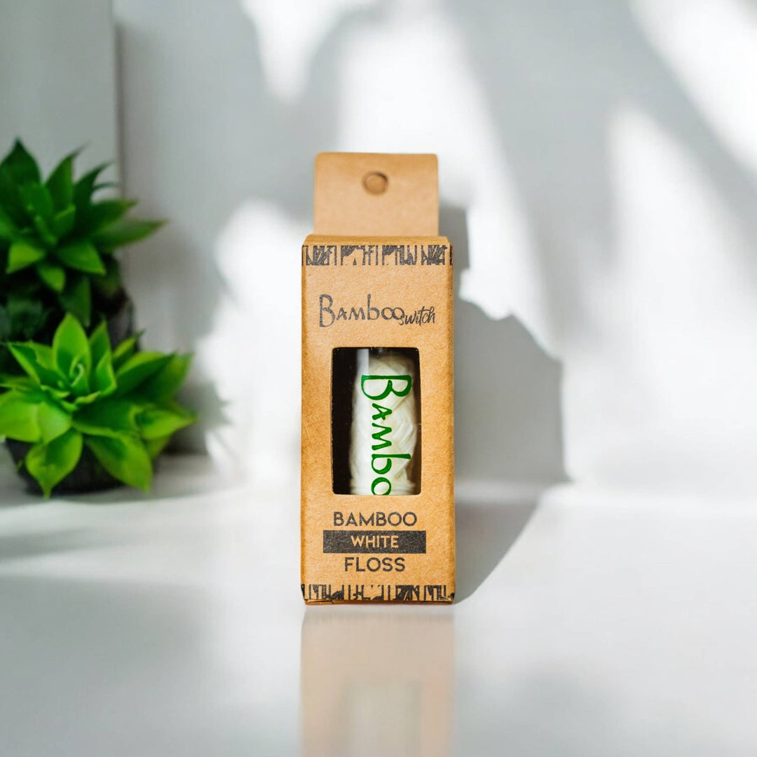White bamboo floss pack with window and green BambooSwitch label