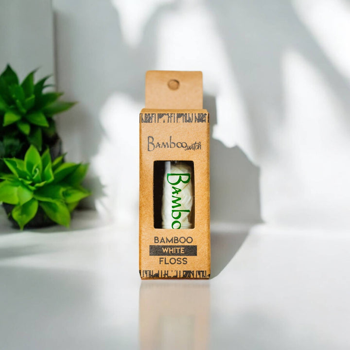 White bamboo floss pack with window and green BambooSwitch label
