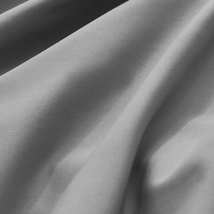 Gray cooling pillowcase fabric close-up with fine woven texture