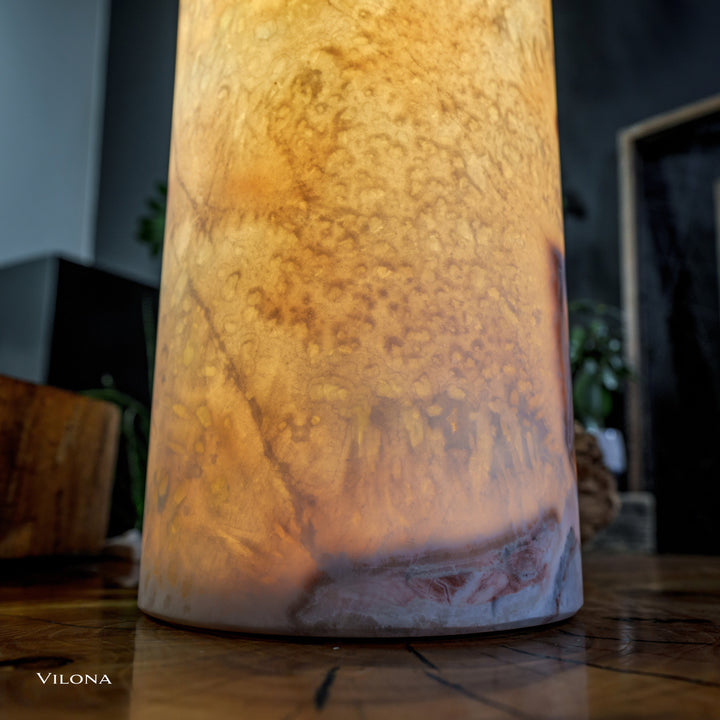 Onyx table lamp lower view: cylindrical base with frosted marble pattern