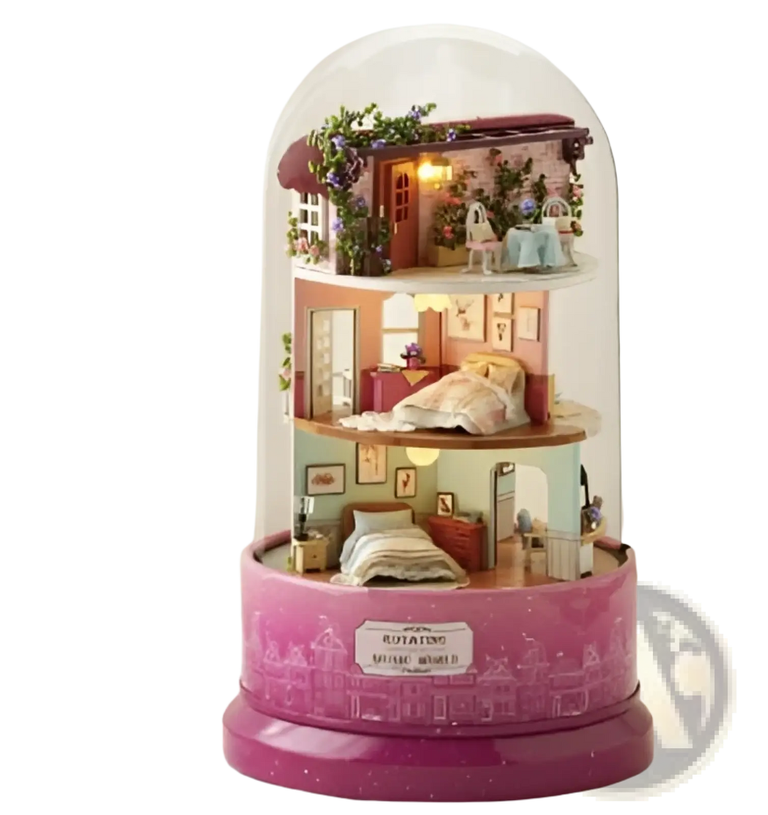 Rotating music box house with clear dome, lit two-story cottage and pink rotating base