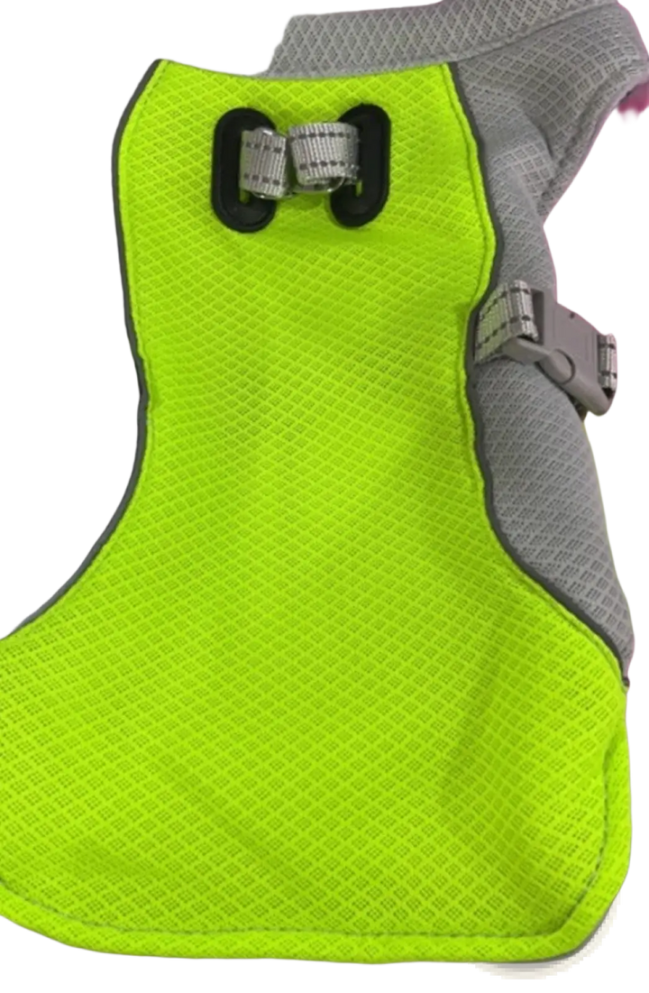 Neon green mesh dog cooling vest with black reflective panel and gray adjustable straps